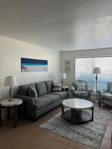 a kitchen with a dining table and chairs