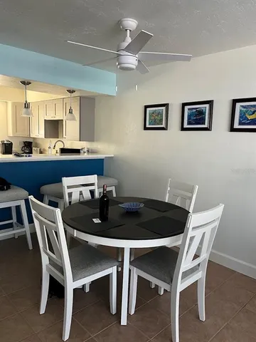 a room with furniture and a flat screen tv