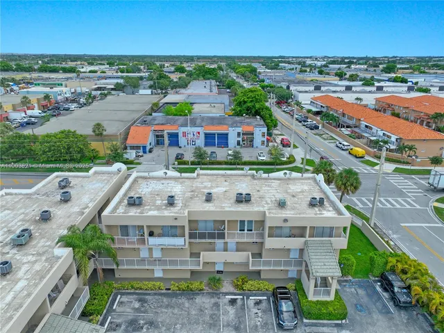 an aerial view of a house with a outdoor space