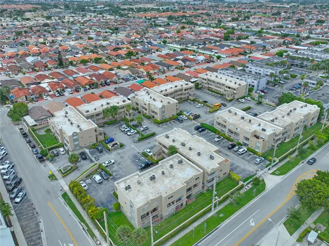 an aerial view of a city with lots of residential buildings
