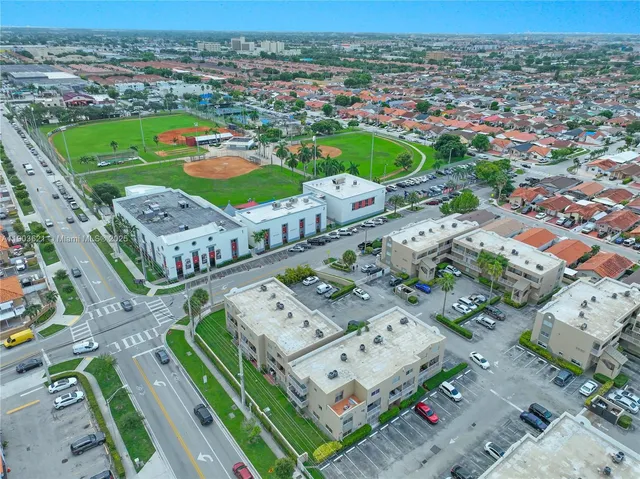 an aerial view of a city with lots of residential buildings