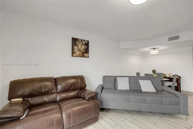 a living room with a couch and a couch