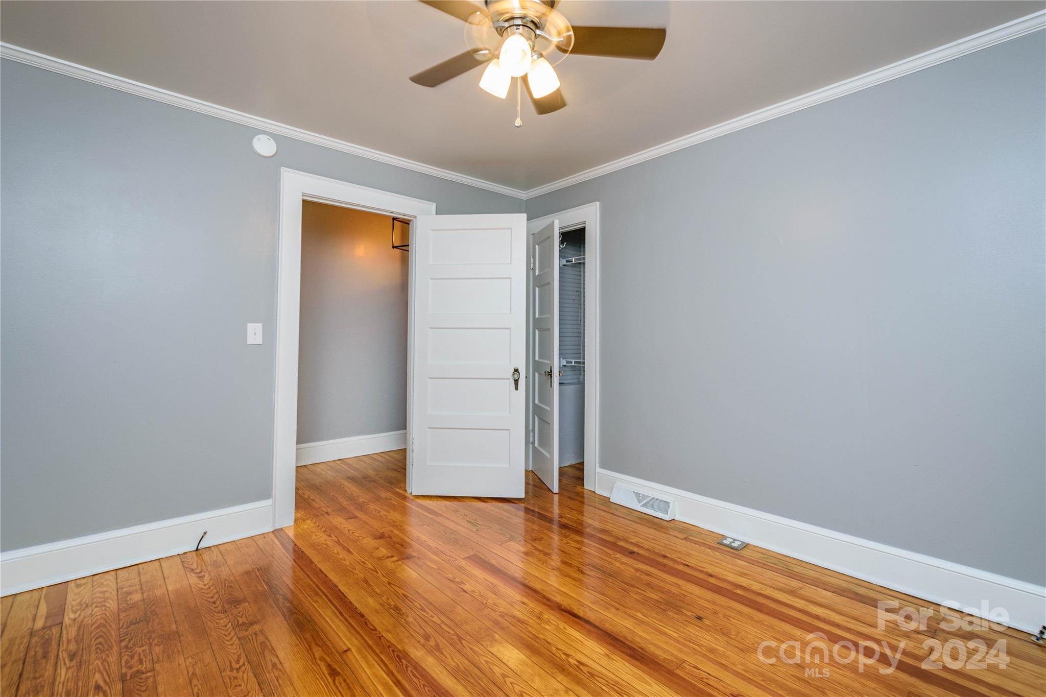 648 Chimney Rock Road Rutherfordton, NC 28139 - Photo 22 of 43 wooden floor in an empty room with a window