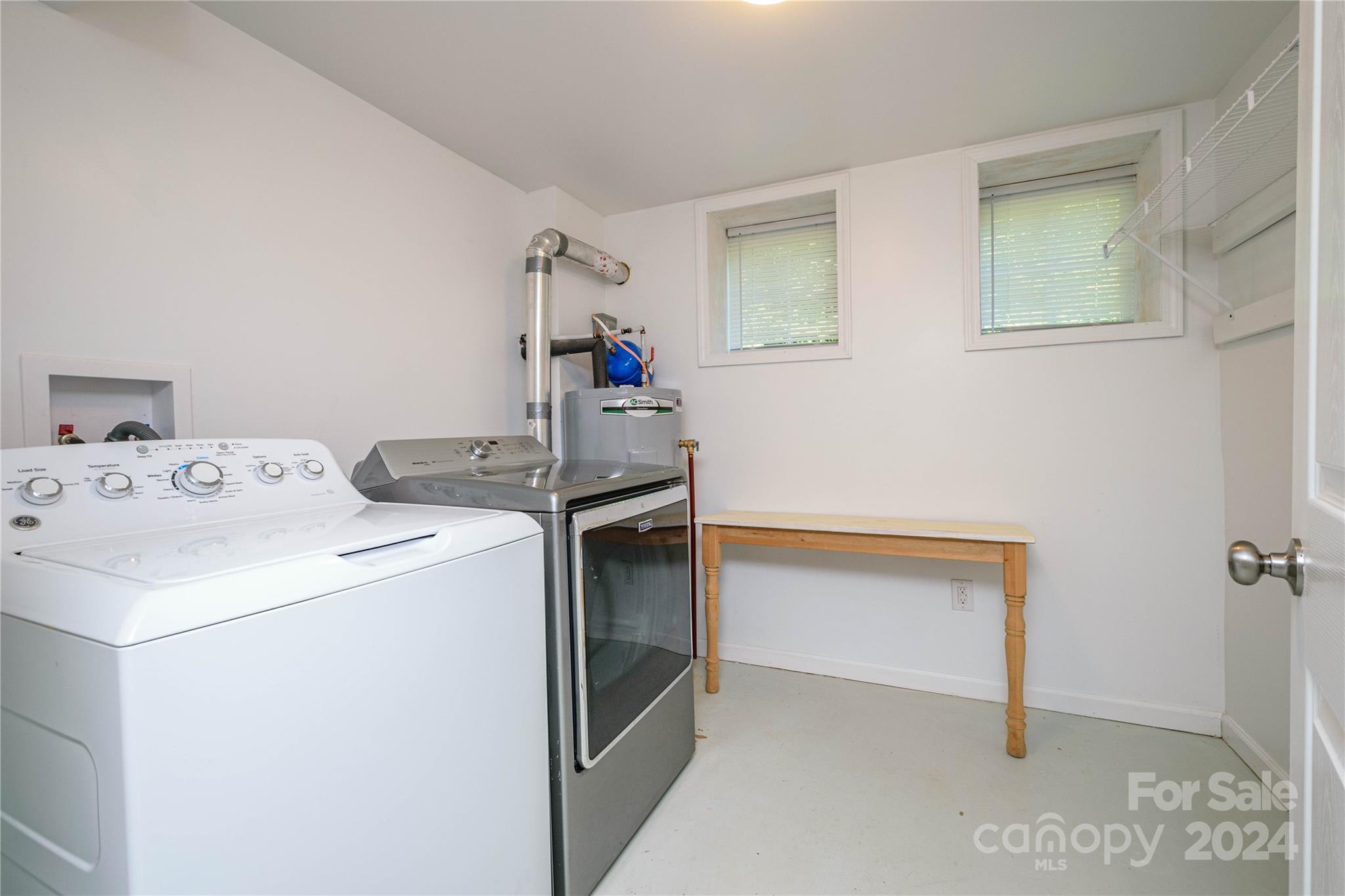 648 Chimney Rock Road Rutherfordton, NC 28139 - Photo 33 of 43 a utility room with dryer and washer