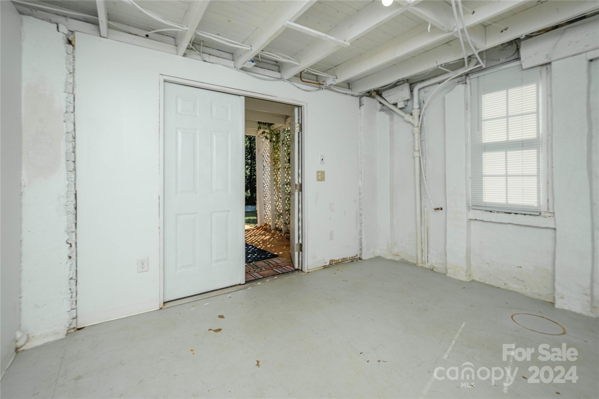 648 Chimney Rock Road Rutherfordton, NC 28139 - Photo 36 of 43 an empty room with windows
