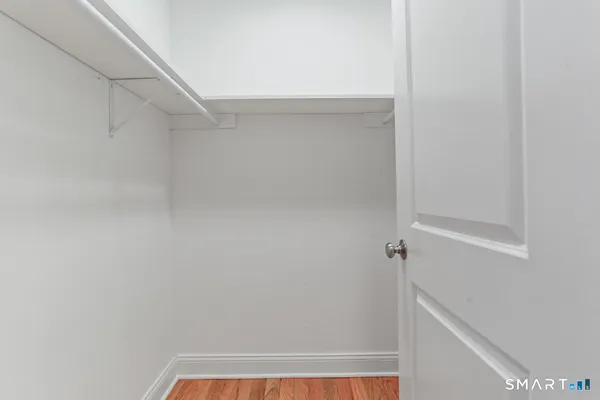 wooden floor in a hall with an entryway