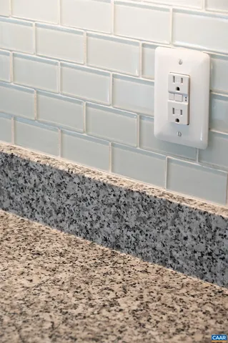 a view of house with backyard outdoor seating and barbeque oven