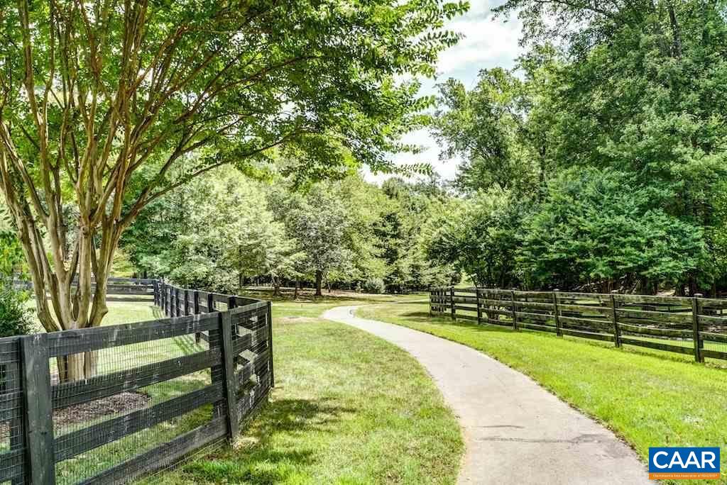 393 Winding Road Keswick, VA 22947 - Photo 51 of 52 Sweeping views of Glenmores on-site Equestrian Center at the entrance to community.