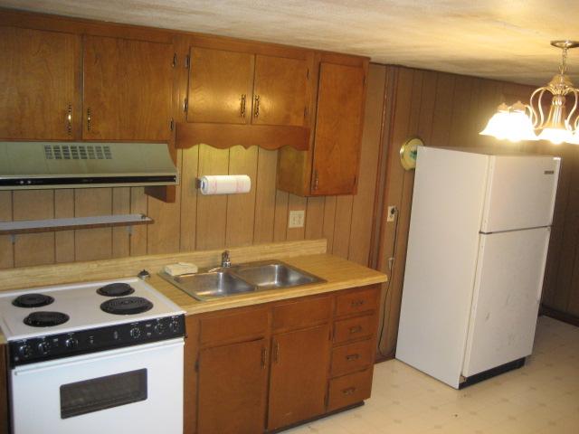 6206 Meacham Road Salem, VA 24153 - Photo 20 of 23 a kitchen with a refrigerator and a sink