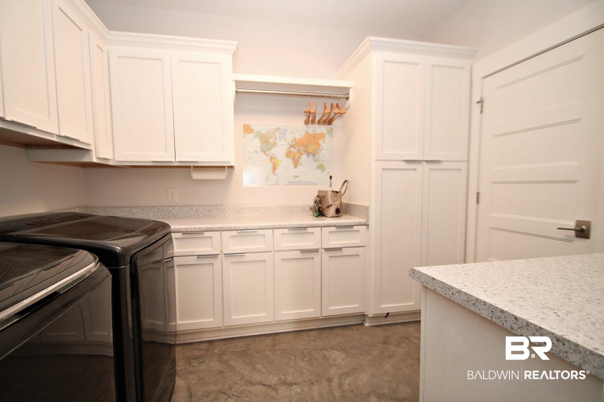 3415 Rue Royal Mobile, AL 36693 - Photo 14 of 31 Laundry room featuring cabinet space and washing machine and clothes dryer