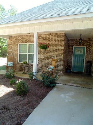 342 Duke Road Perry, GA 31069 - Photo 2 of 34 a front view of a house with a yard