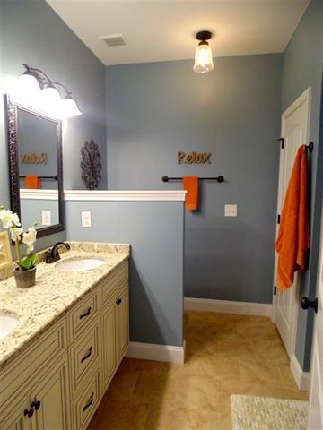 342 Duke Road Perry, GA 31069 - Photo 15 of 34 a bathroom with a granite countertop sink and a mirror