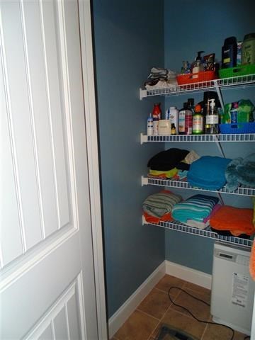 342 Duke Road Perry, GA 31069 - Photo 18 of 34 a room with lots of different colored cloths