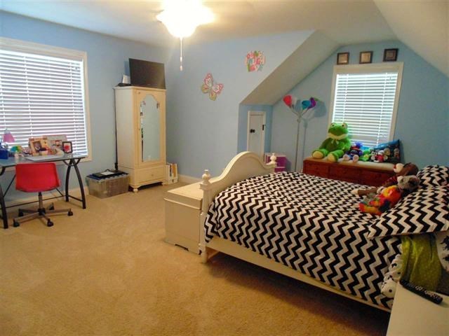 342 Duke Road Perry, GA 31069 - Photo 26 of 34 a bedroom with a bed and a window