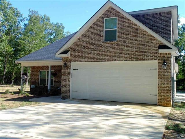 342 Duke Road Perry, GA 31069 - Photo 28 of 34 a view of a house with a garage