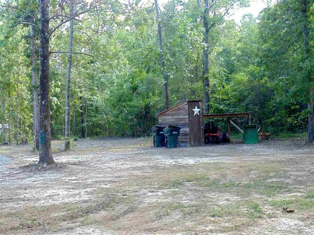 342 Duke Road Perry, GA 31069 - Photo 29 of 34 a wooden fence with trees in the background