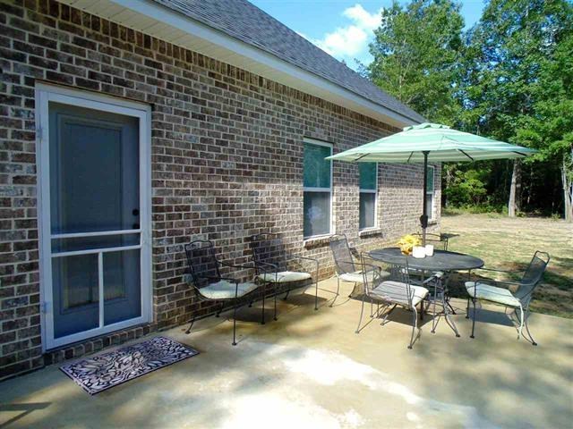 342 Duke Road Perry, GA 31069 - Photo 30 of 34 a backyard of a house with outdoor seating