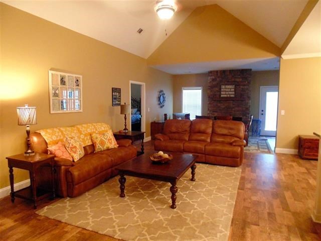 342 Duke Road Perry, GA 31069 - Photo 4 of 34 a living room with furniture and a wooden floor