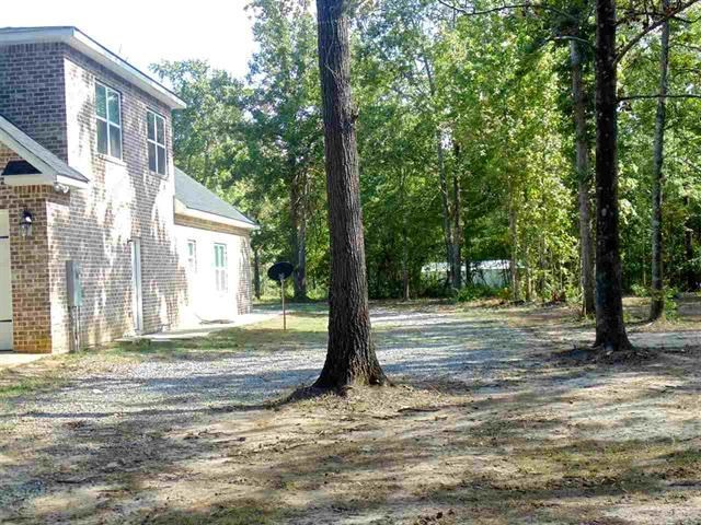 342 Duke Road Perry, GA 31069 - Photo 33 of 34 a view of a house with backyard and trees