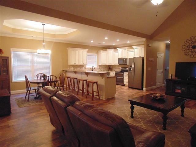342 Duke Road Perry, GA 31069 - Photo 6 of 34 a living room with lots of furniture and kitchen view