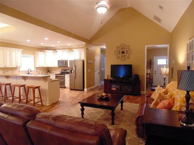 342 Duke Road Perry, GA 31069 - Photo 7 of 34 a living room with furniture and a flat screen tv