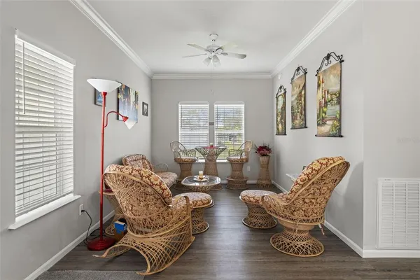 a living room with furniture and a window