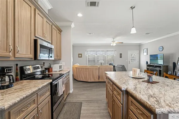a kitchen with granite countertop lots of counter top space