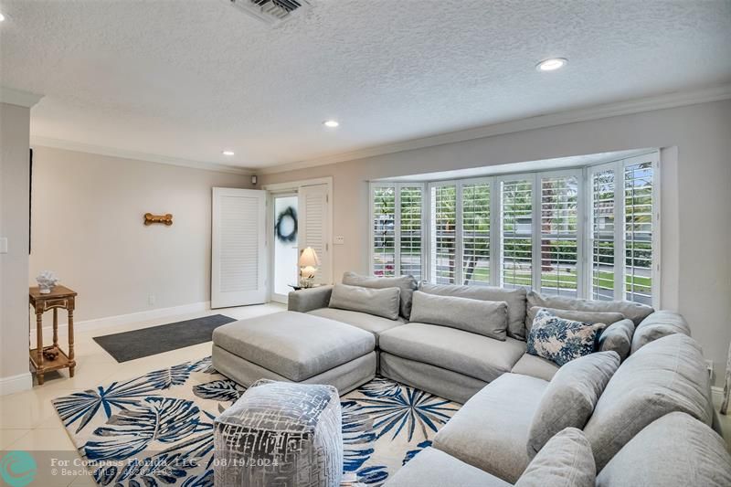 Undisclosed Address Pompano Beach, FL 33062 - Photo 12 of 63 a living room with furniture and a window