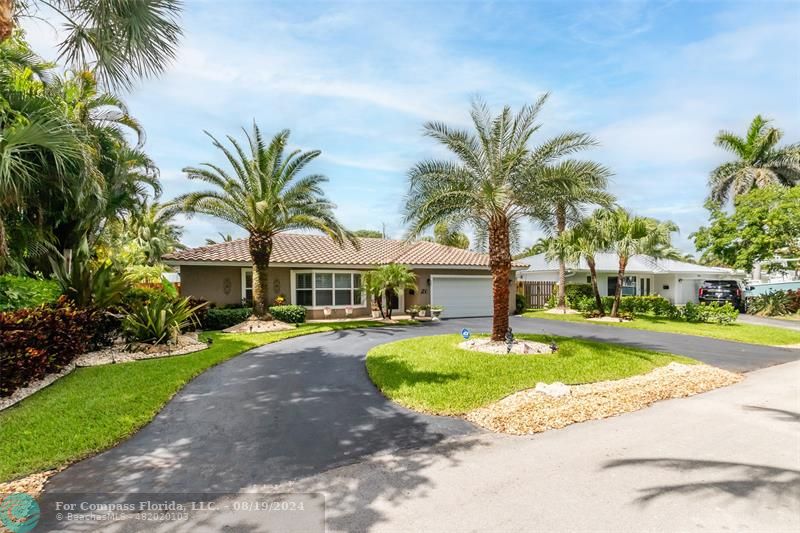 Undisclosed Address Pompano Beach, FL 33062 - Photo 2 of 63 a view of a house with swimming pool and sitting area