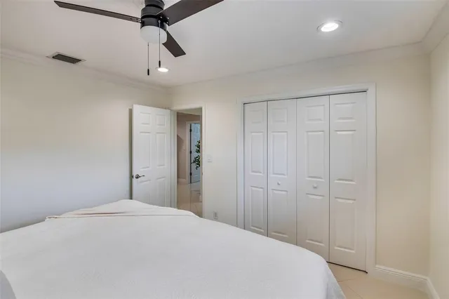 a utility room with cabinets washer and dryer