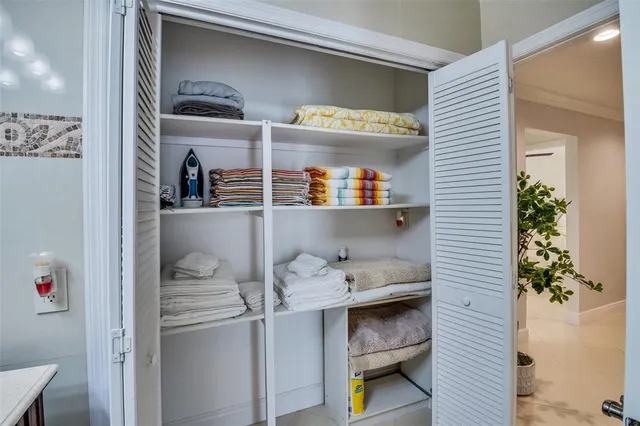 a view of a house with a swimming pool and a yard