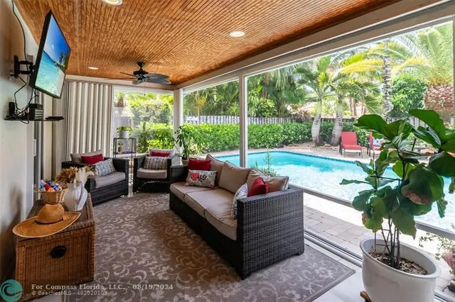 a view of a yard with a house in the background