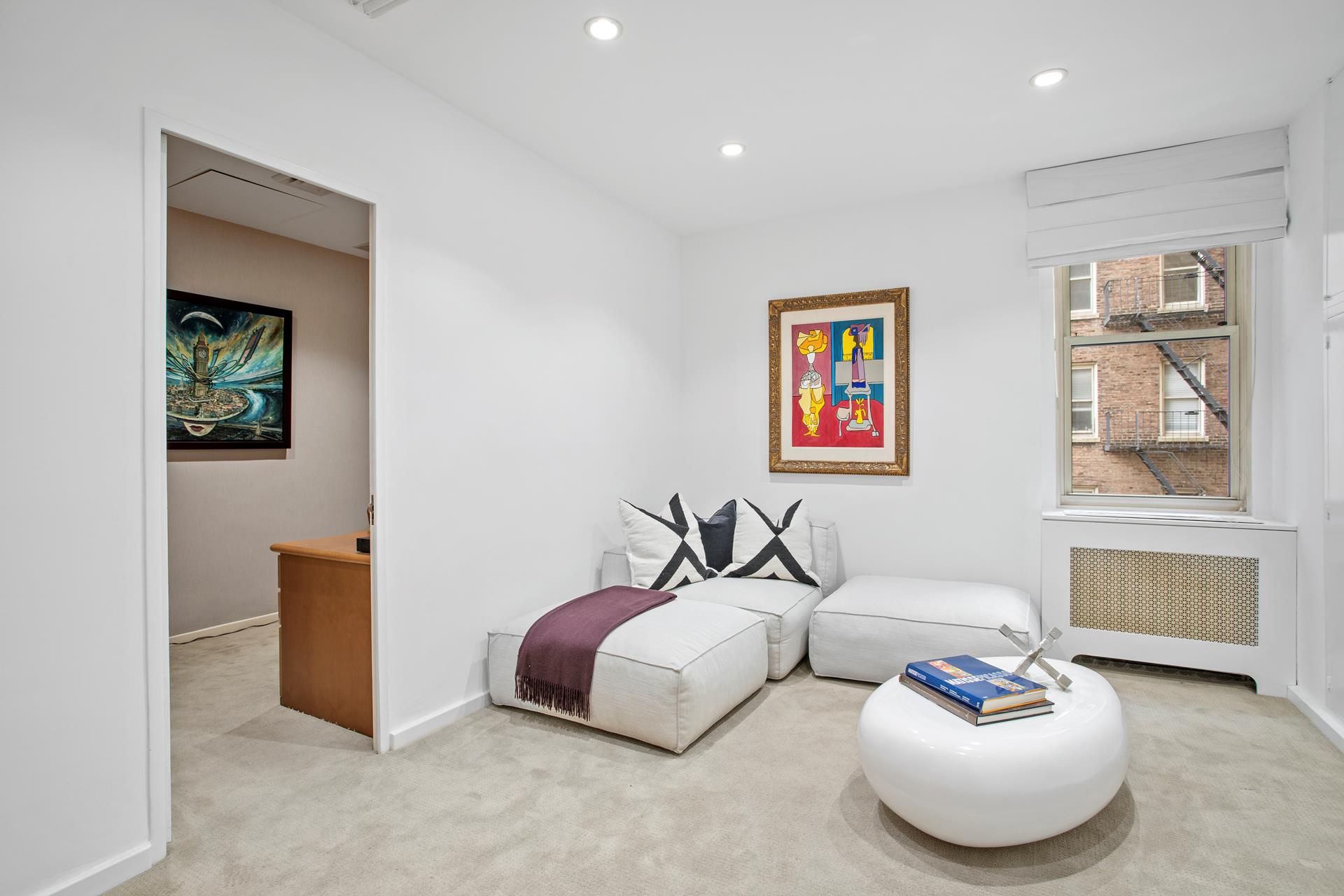 120 East End Avenue, Unit 3C Manhattan, NY 10028 - Photo 13 of 16 a bedroom with bed and a couch