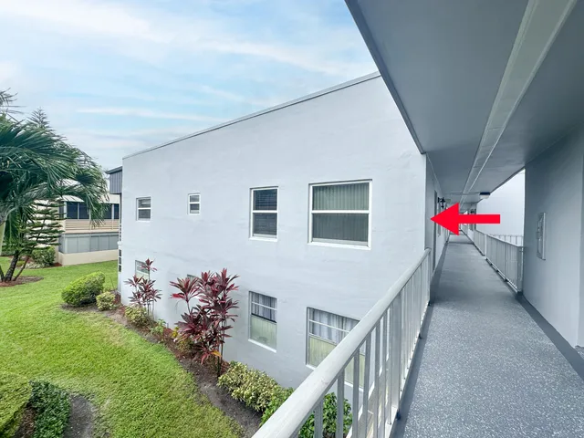 a front view of a house with yard