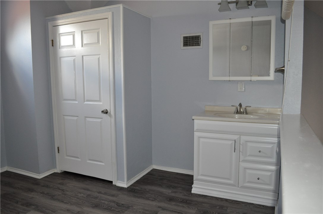 706 West 22nd Street, Unit 305 Austin, TX 78705 - Photo 19 of 20 2nd bedroom showing vanity and closet