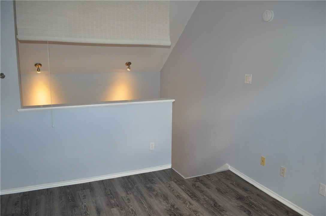 706 West 22nd Street, Unit 305 Austin, TX 78705 - Photo 20 of 20 2nd bedroom showing staircase to downstairs