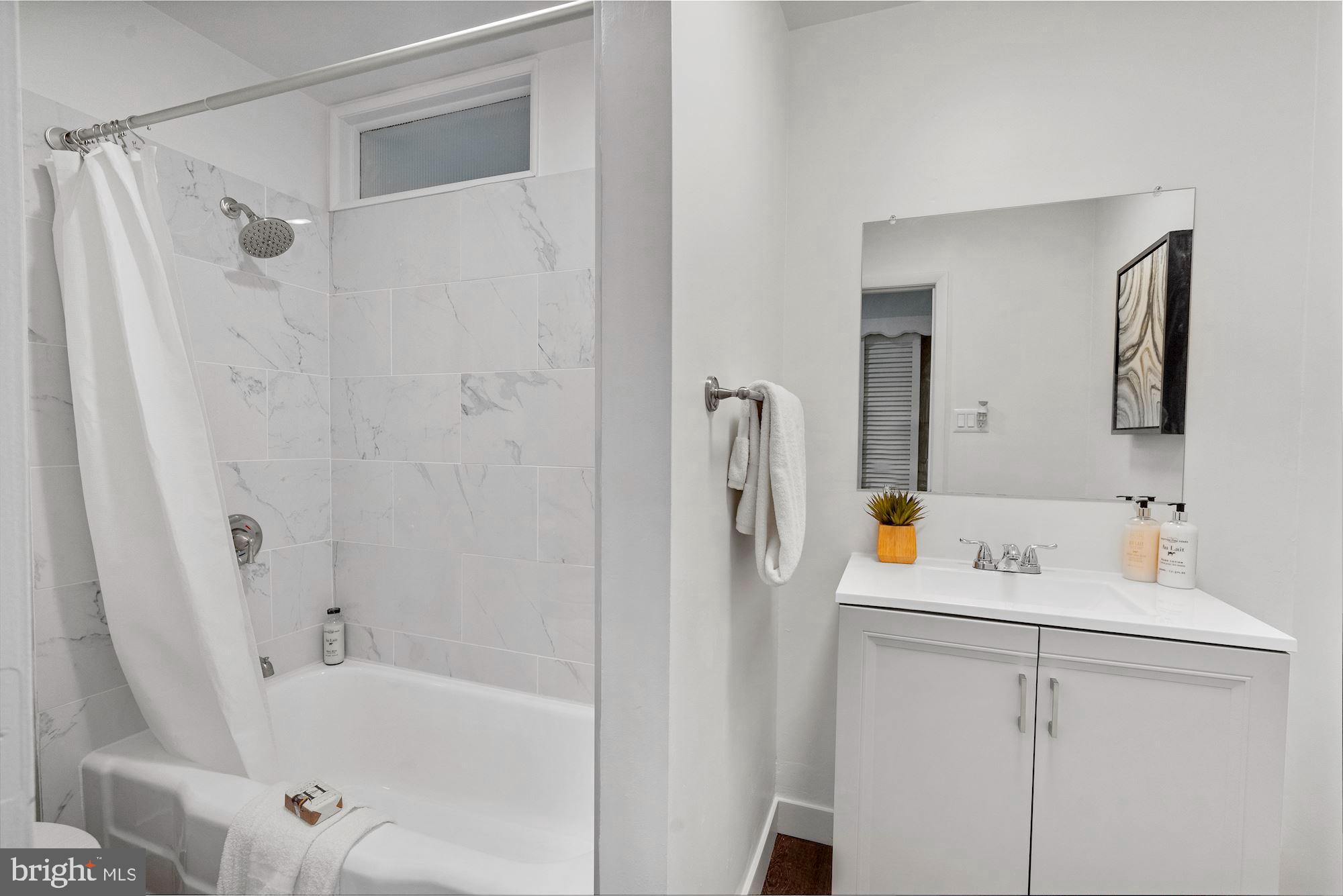 11225 Bybee Court Silver Spring, MD 20902 - Photo 23 of 31 Renovated Hall Bath with High-End Finishes