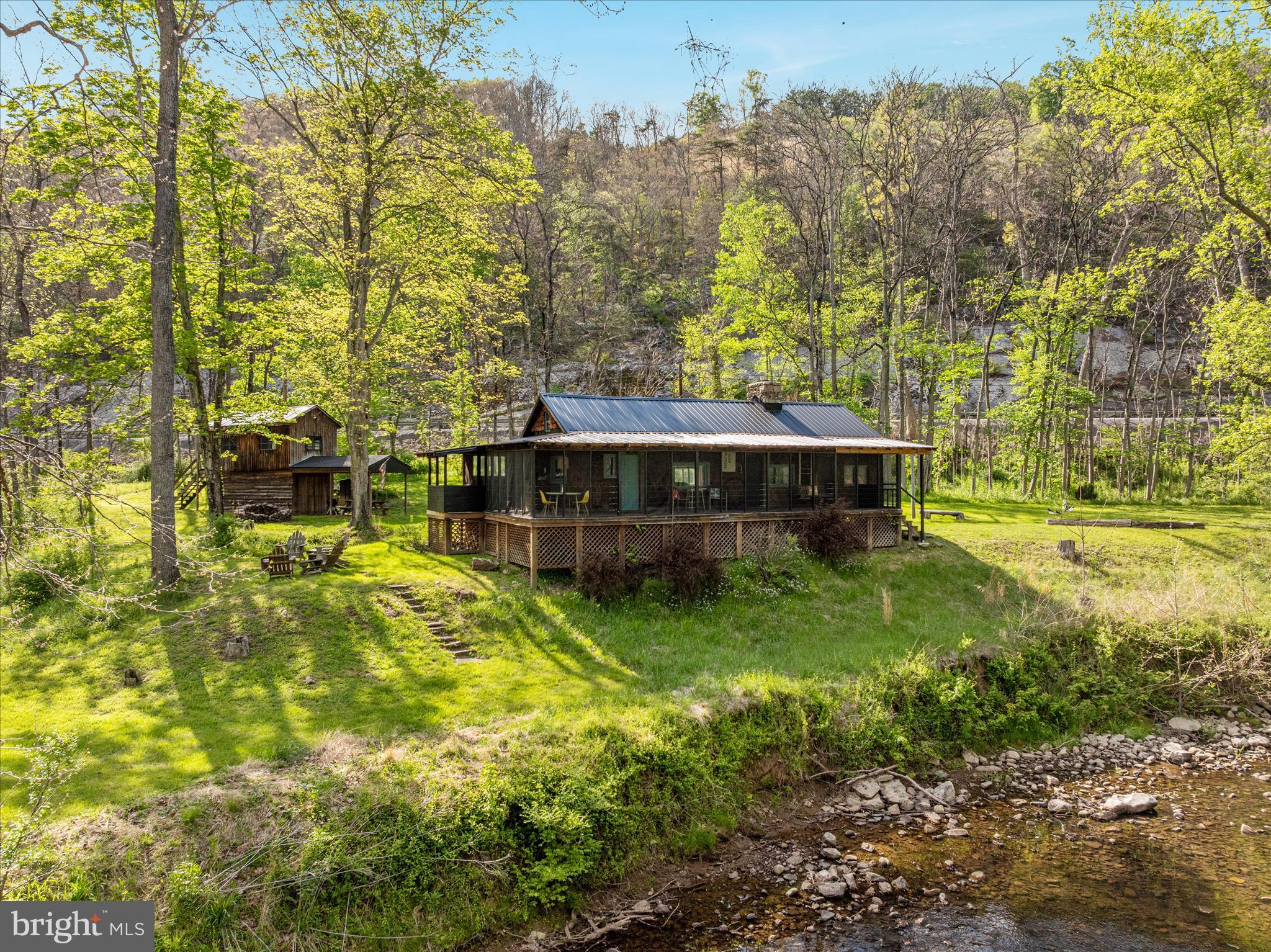 9897 Carpers Pike Yellow Spring, WV 26865 - Photo 2 of 45 DJI_20260504164758_0649_D_twilight_9897 Carpers Pi