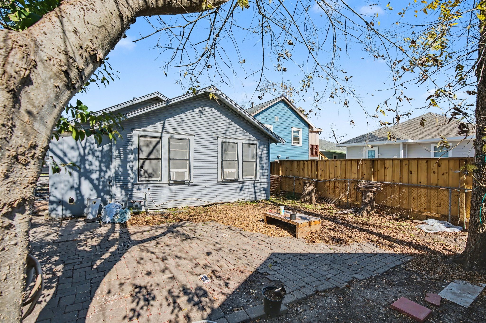 1222 Genova Street Houston, TX 77009 - Photo 15 of 15 a view of a backyard with a tree