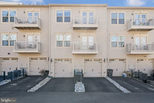 a front view of a building with a road