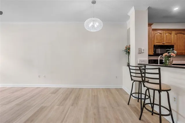 a room with a table and chairs