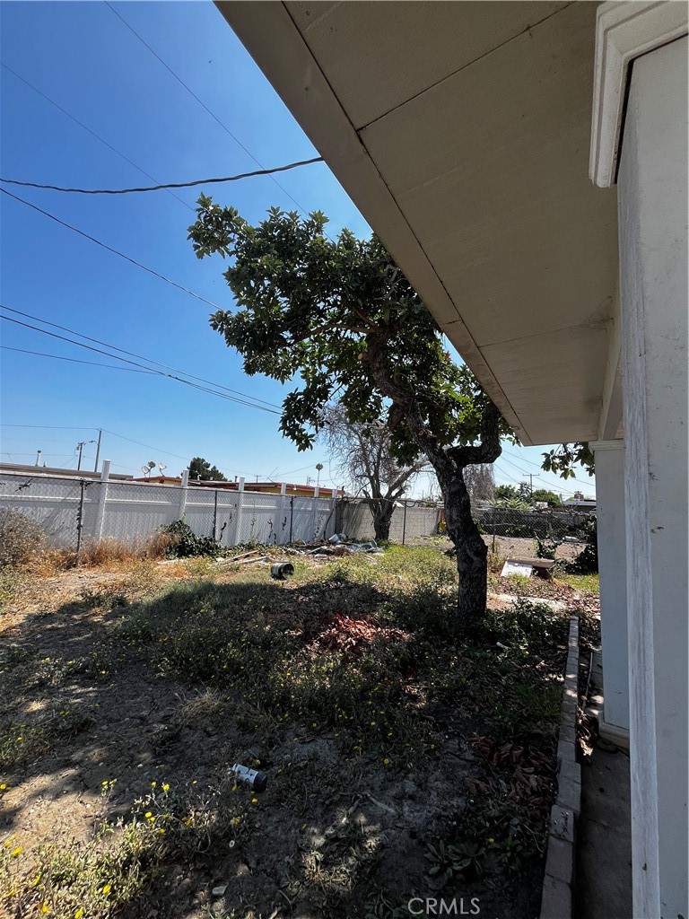 1609 West 166th Street Compton, CA 90220 - Photo 14 of 19 BACK YARD HAS A NICE COVERED PATIO AREA