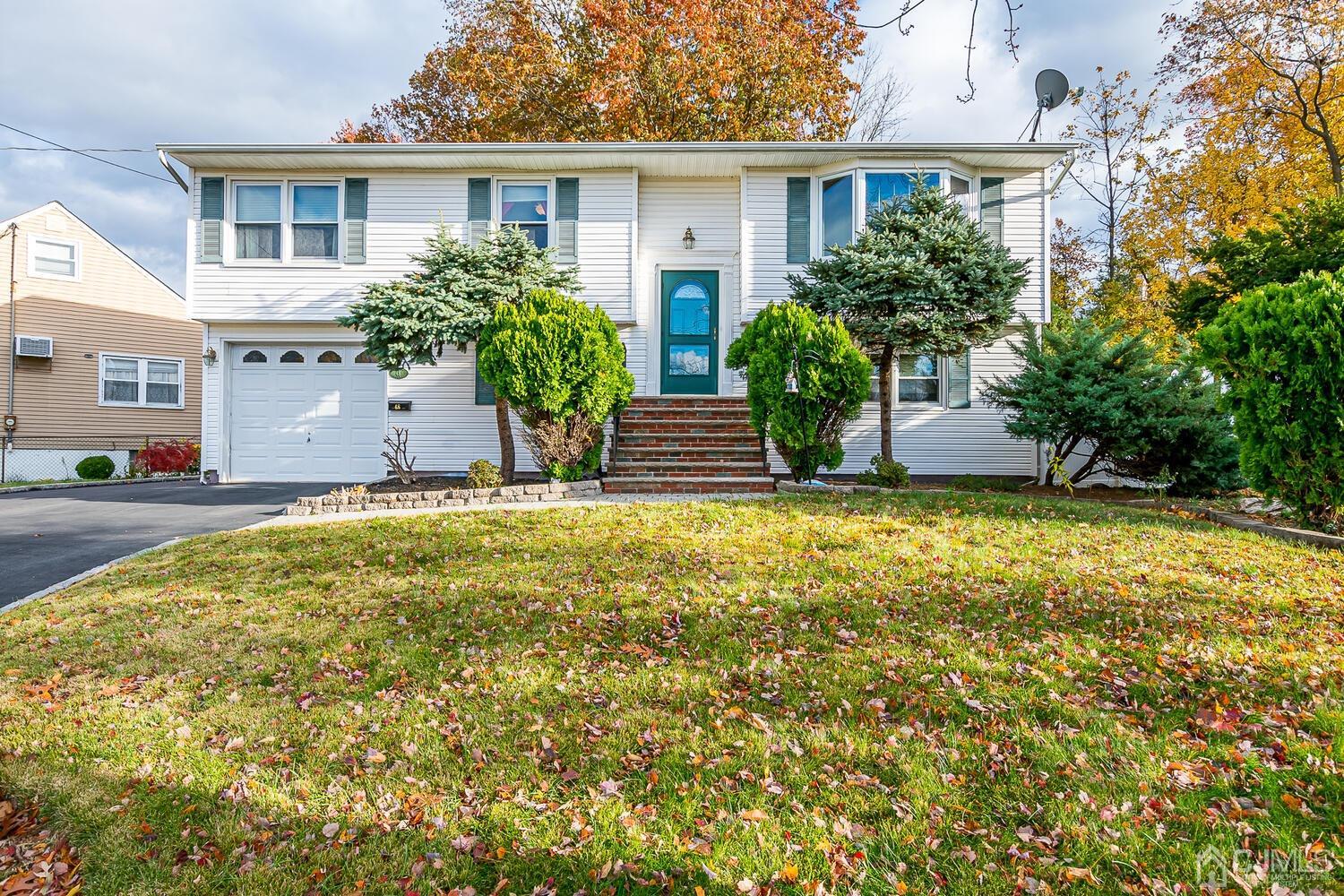 48 Brandywine Road Fords, NJ 08863 - Photo 1 of 29 a front view of house with yard and trees around