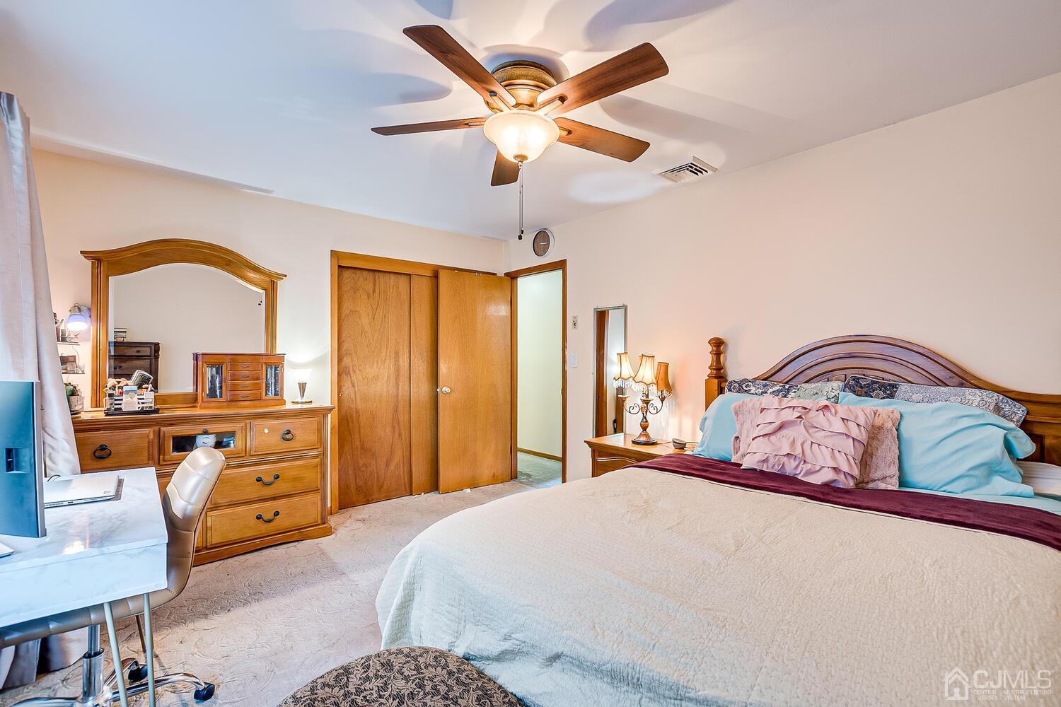 48 Brandywine Road Fords, NJ 08863 - Photo 14 of 29 a bedroom with a bed and a dresser