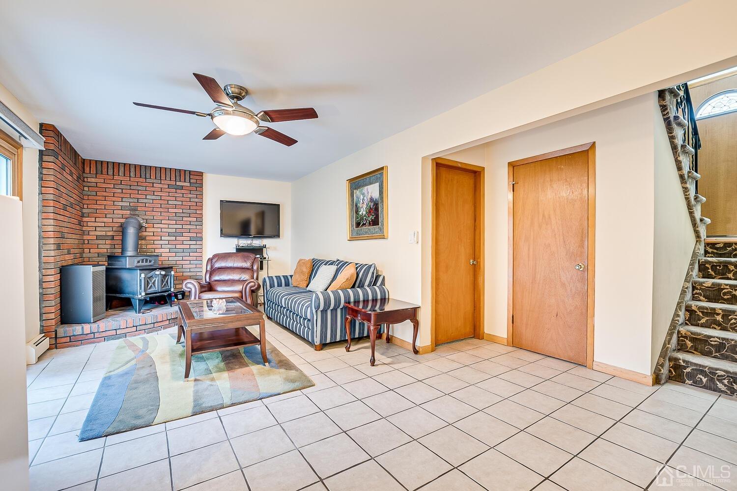 48 Brandywine Road Fords, NJ 08863 - Photo 21 of 29 a living room with furniture and a window