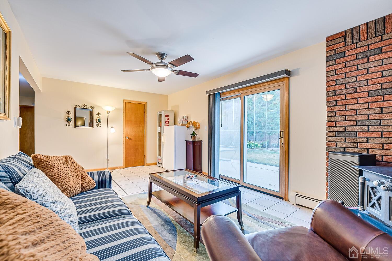 48 Brandywine Road Fords, NJ 08863 - Photo 23 of 29 a living room with furniture and a window