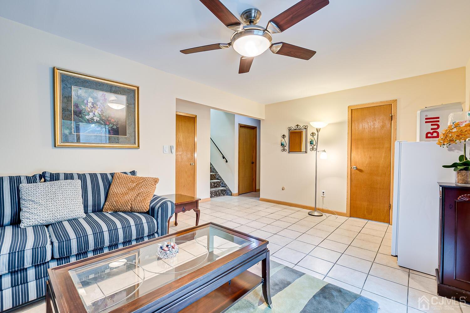 48 Brandywine Road Fords, NJ 08863 - Photo 24 of 29 a living room with furniture and a ceiling fan