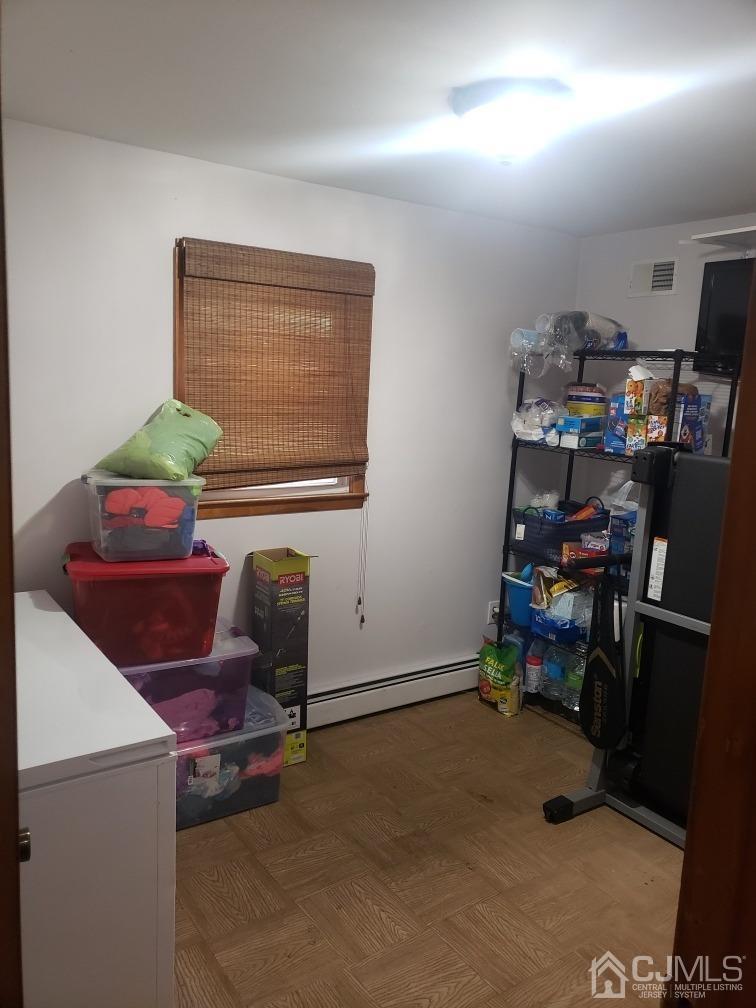 48 Brandywine Road Fords, NJ 08863 - Photo 25 of 29 a room with furniture and musical instruments