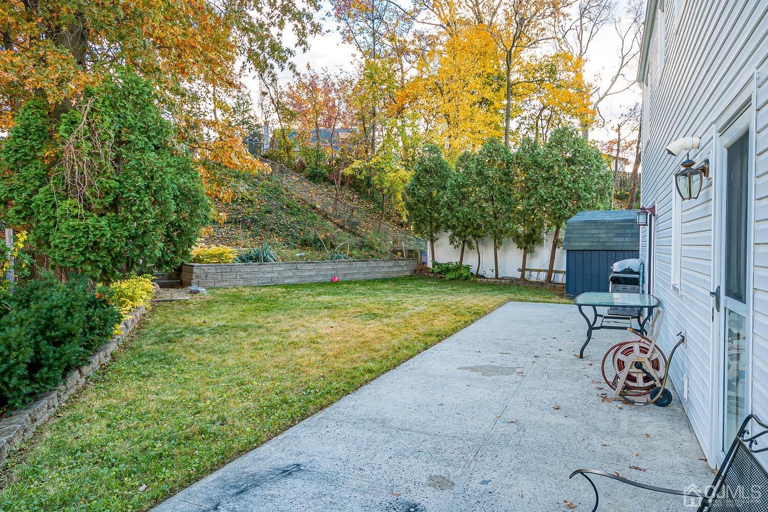 48 Brandywine Road Fords, NJ 08863 - Photo 28 of 29 a view of a backyard with a garden and plants