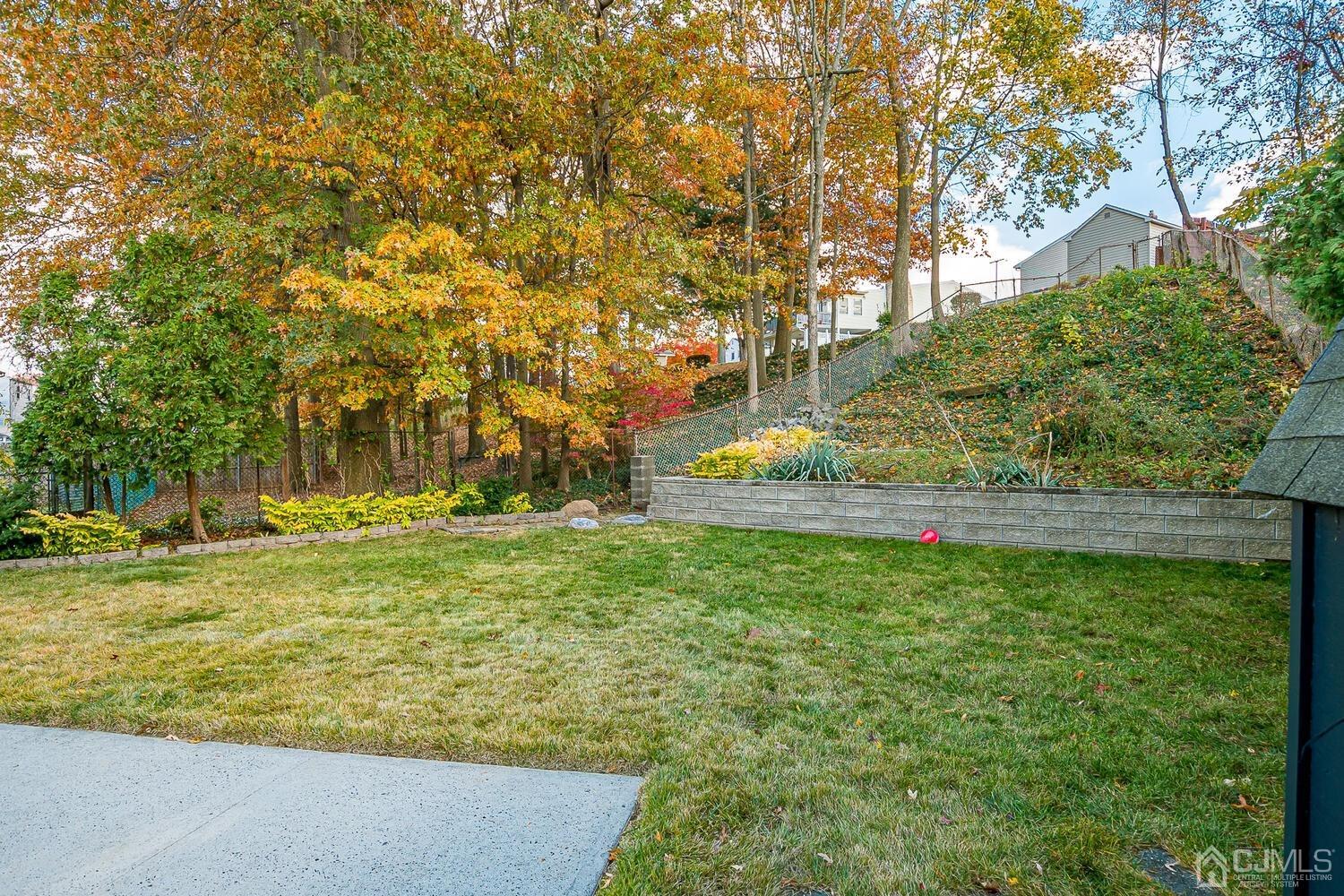 48 Brandywine Road Fords, NJ 08863 - Photo 29 of 29 a view of a yard with trees